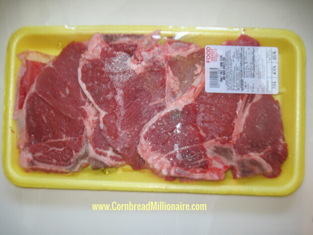 Steaks still in the packaging.