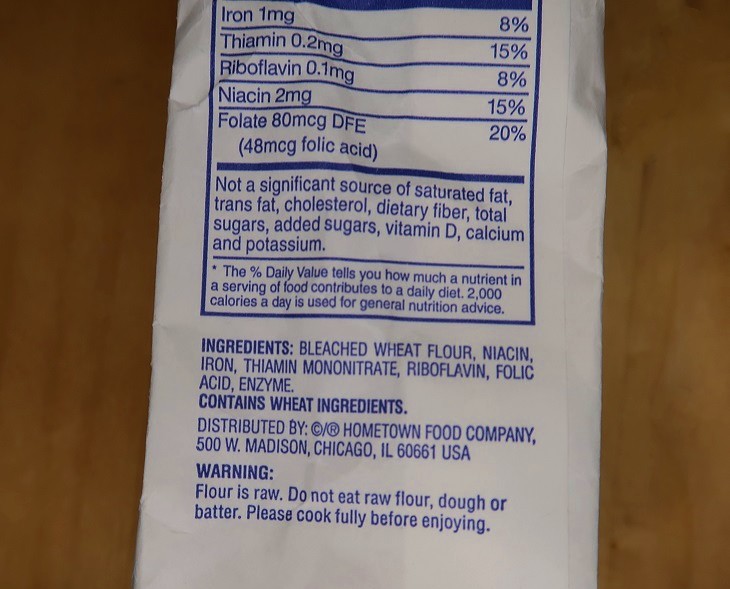 WARNING:  Never eat raw flour is printed on side of bag.