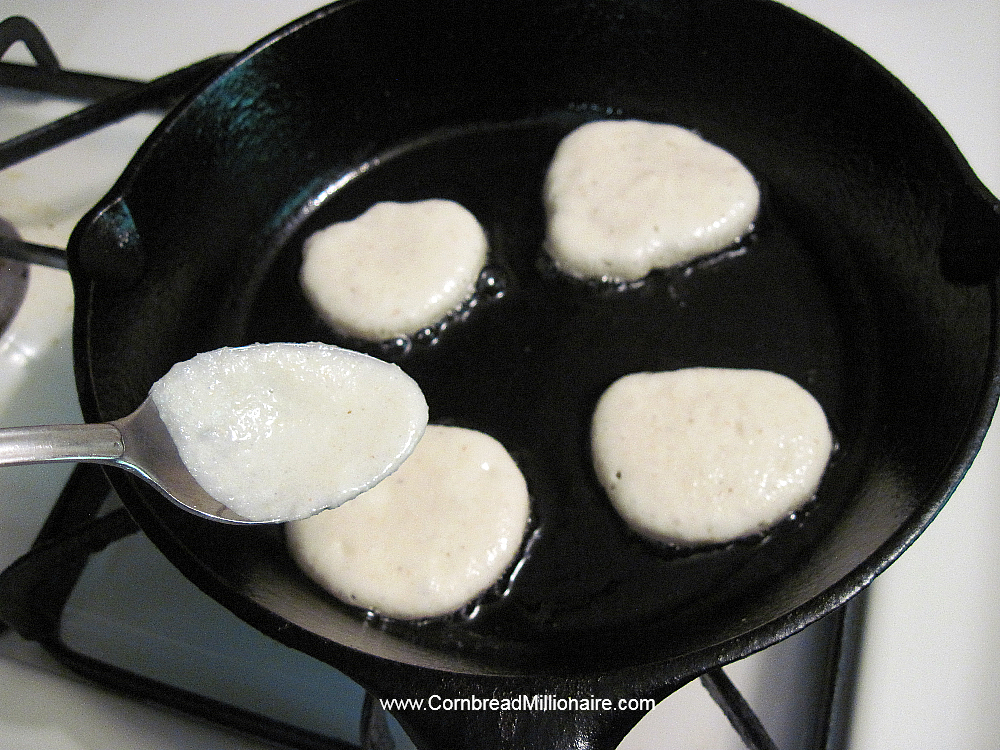 Stovetop Mini Flapjacks frying in skillet with hot vegetable oil.