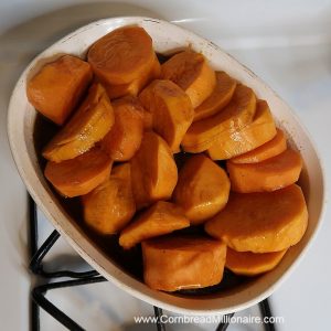 Glaze poured over sweet potatoes.