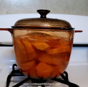 Boil sweet potatoes until fork tender.